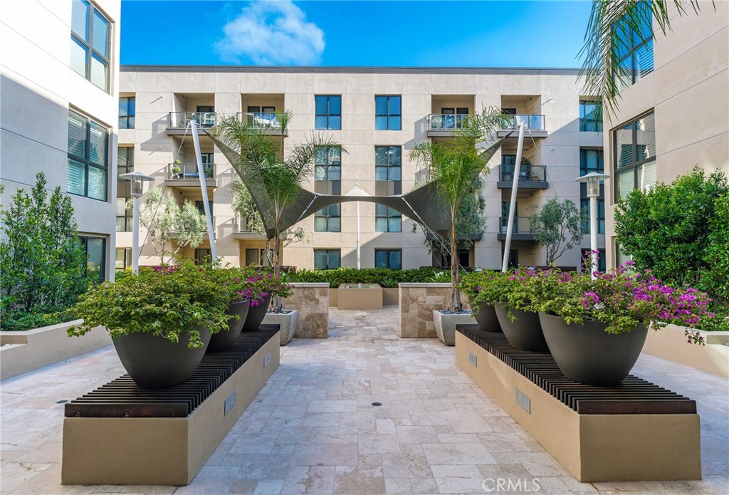 3211 Rivington Irvine, CA 92612 - Photo 48 of 49 a view of a building with potted plants