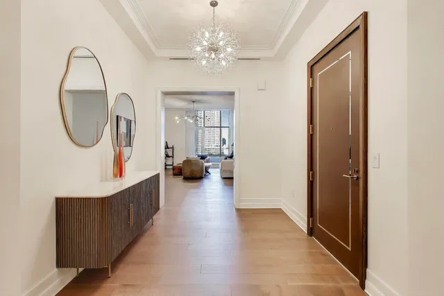 a bathroom with a granite countertop toilet a sink and a bathtub