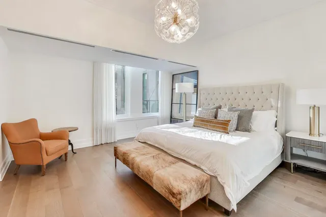 a view of a workspace with furniture