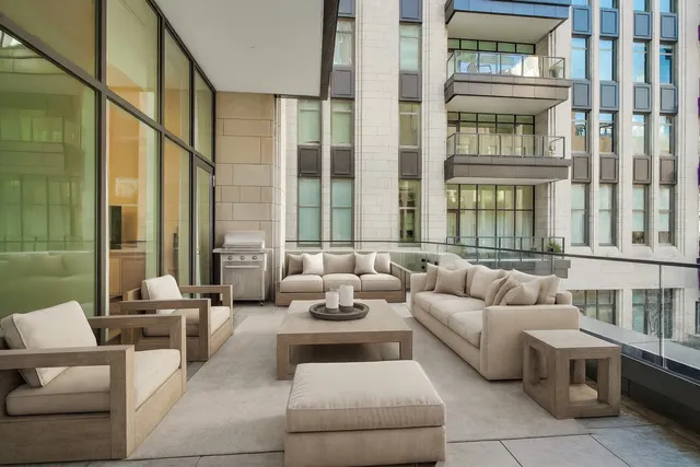 a bathroom with a granite countertop sink toilet a shower and a mirror
