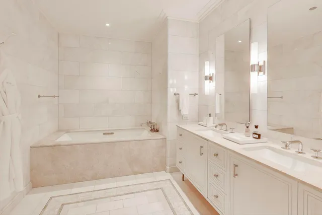 a living room with furniture and a piano