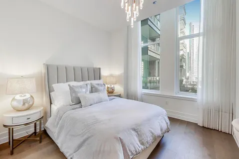 a view of a livingroom with furniture and workspace