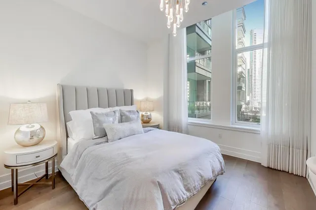a view of a livingroom with furniture and workspace