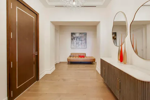 a bedroom with a bed and ceiling fan