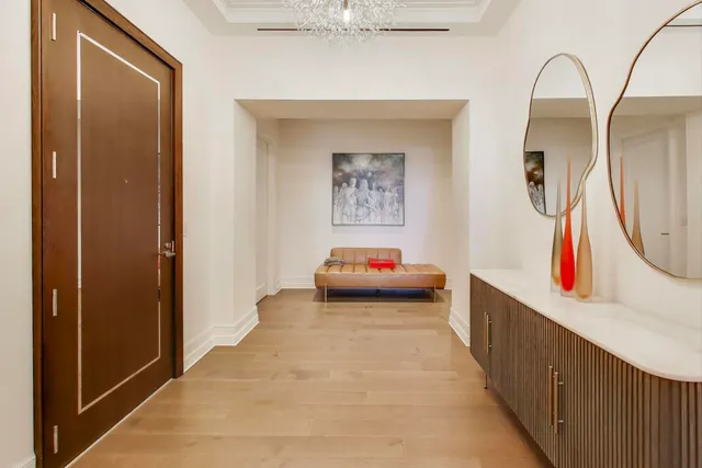 a bedroom with a bed and ceiling fan