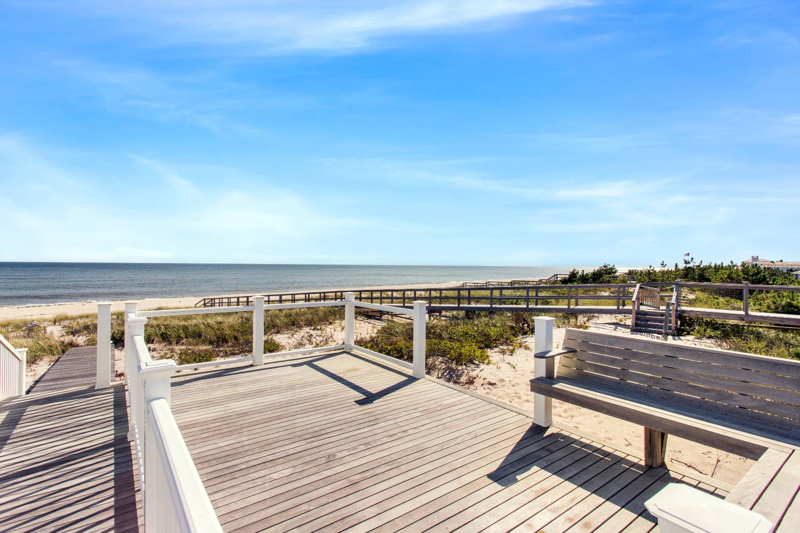 124 Dune Road Quogue, NY 11959 - Photo 8 of 34 a view of roof deck with city view and ocean view