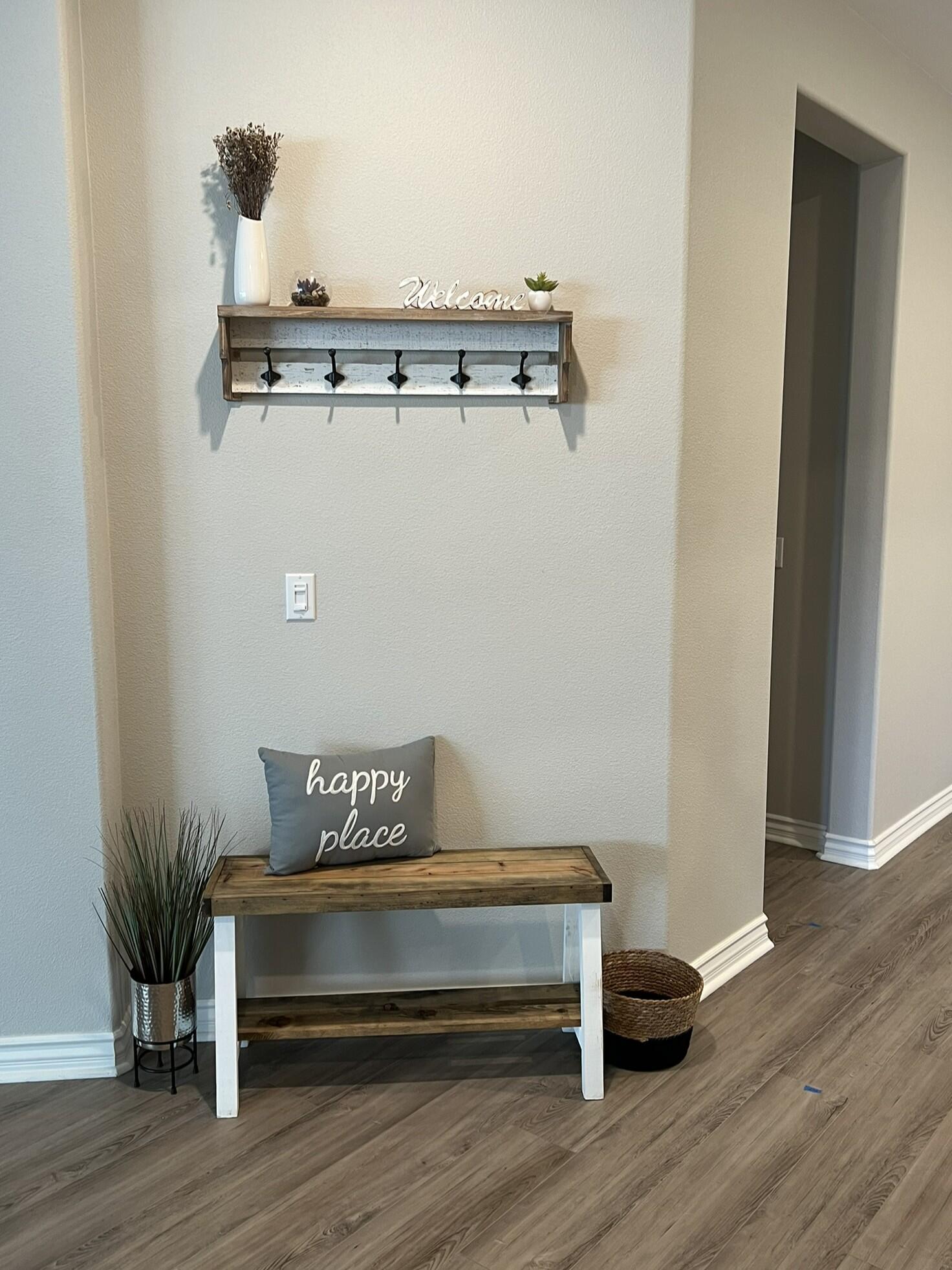 41867 Regona Road Indio, CA 92203 - Photo 11 of 65 a view of a hallway with wooden floor