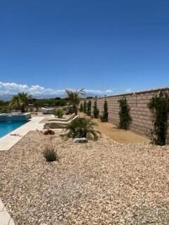 41867 Regona Road Indio, CA 92203 - Photo 31 of 65 a view of a lake with a mountain