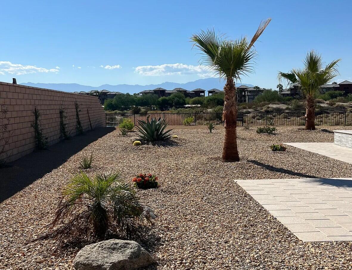 41867 Regona Road Indio, CA 92203 - Photo 36 of 65 a view of a terrace with a yard