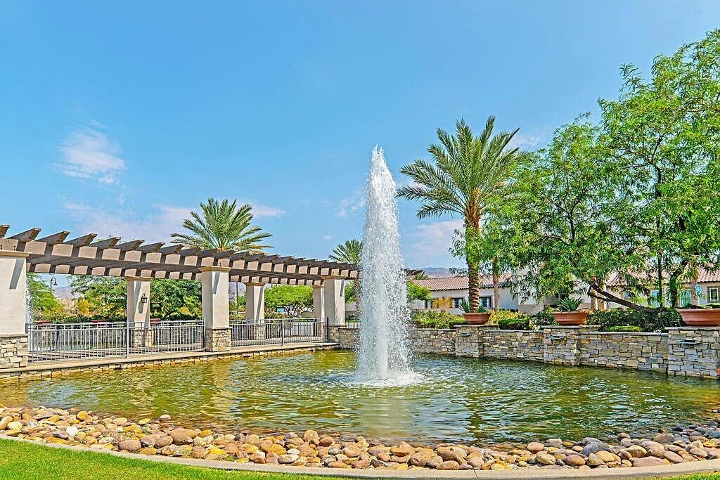 41867 Regona Road Indio, CA 92203 - Photo 59 of 65 a view of a swimming pool with a garden