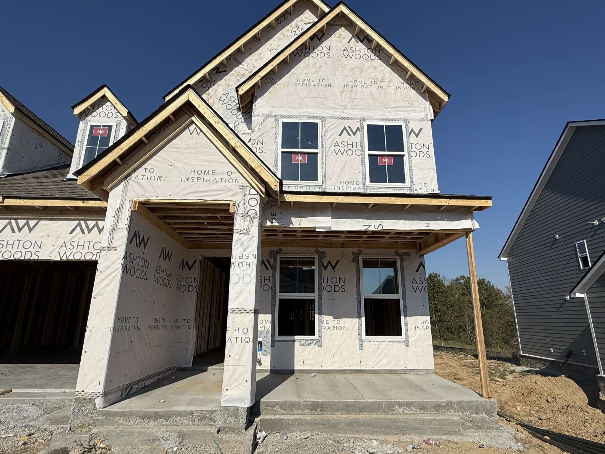 151 Emeline Way Mount Juliet, TN 37122 - Photo 18 of 51 a view of a white house with large windows