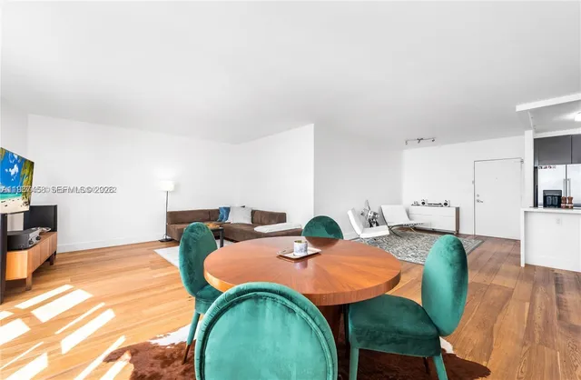 a view of a dining room with furniture
