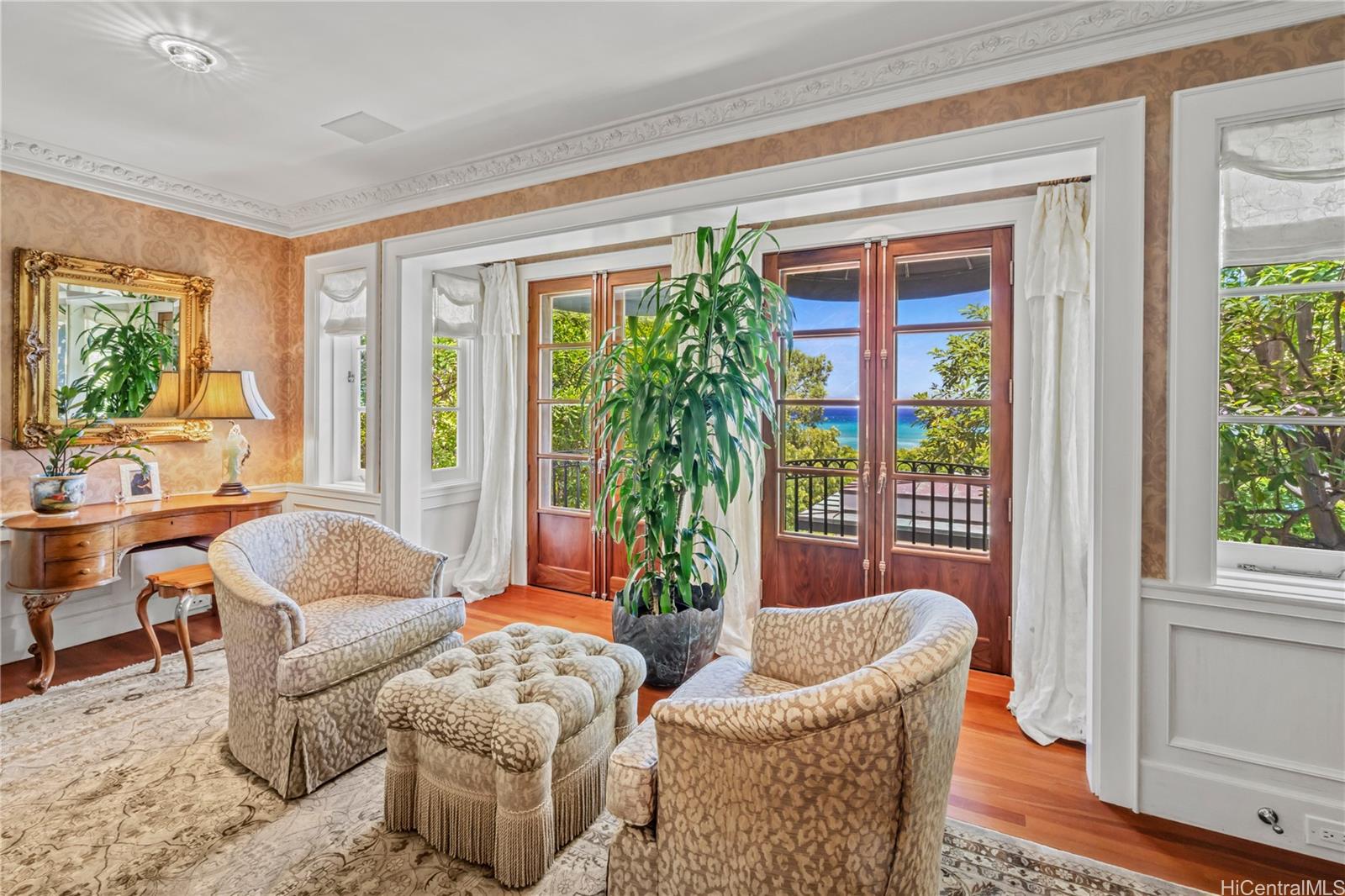 2955 Makalei Place Honolulu, HI 96815 - Photo 13 of 25 a living room with furniture and a potted plant