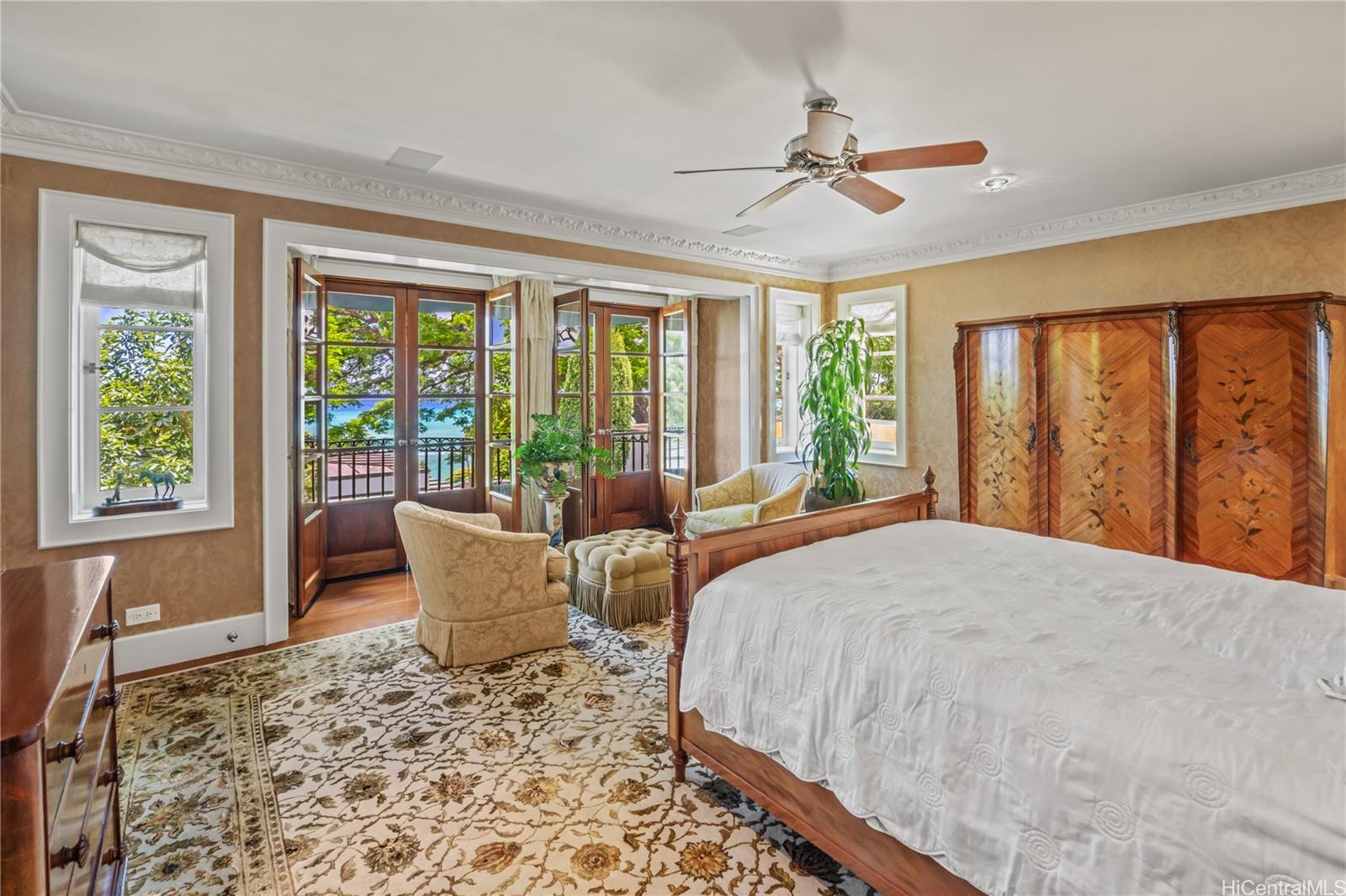 2955 Makalei Place Honolulu, HI 96815 - Photo 18 of 25 a bed sitting in a spacious bedroom next to a window
