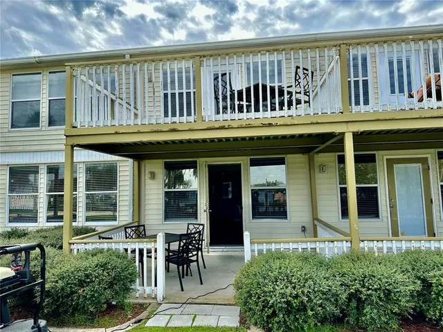 a view of a cafe with a table and chairs