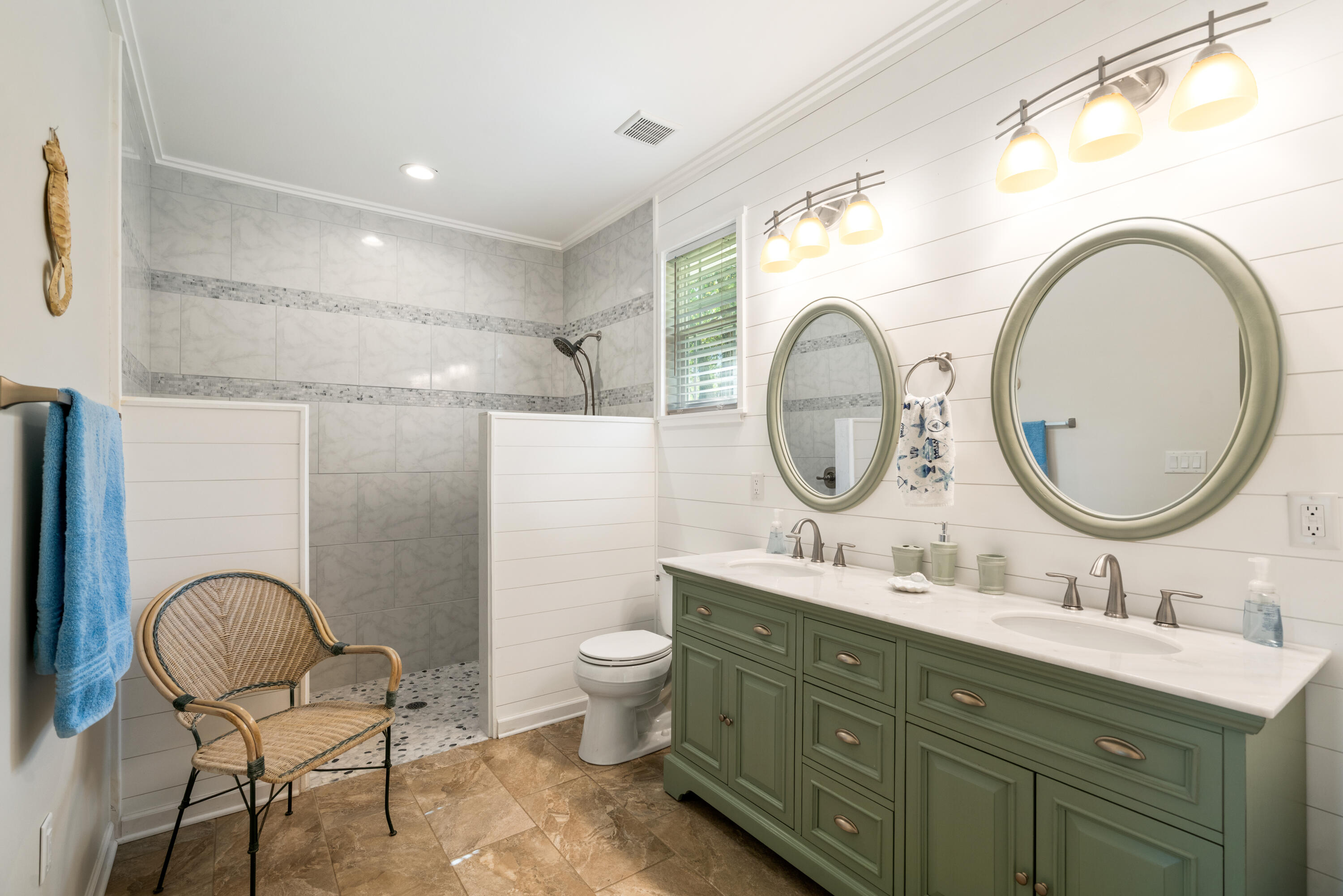 528 Bay Grove Road Freeport, FL 32439 - Photo 18 of 68 a bathroom with a toilet a sink and a mirror