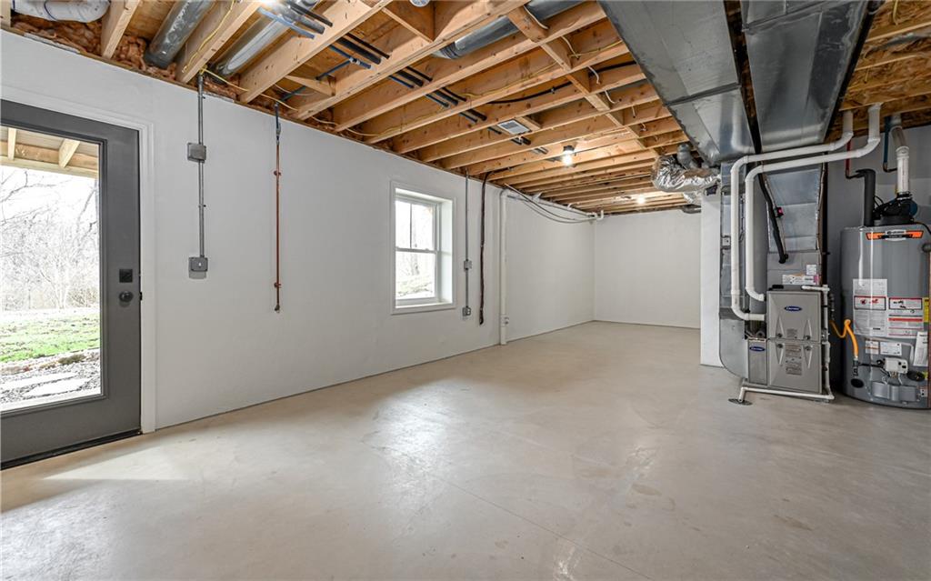 1773 Locust Road Sewickley, PA 15143 - Photo 33 of 34 Poured foundation walk out basement. Carrier furnace and A/C with 50 gallon hot water tank.