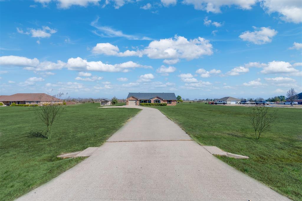 3418 Fm 38 Street North Brookston, TX 75421 - Photo 20 of 22 a view of a golf course with a yard