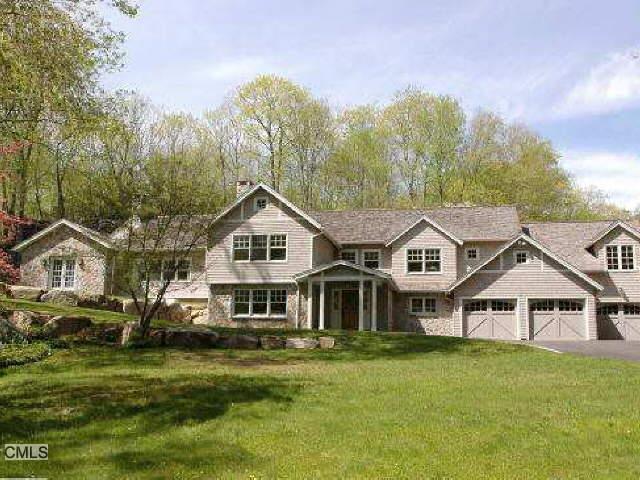 35 Rogues Ridge Road Weston, CT 06883 - Photo 1 of 1 a front view of a house with a garden