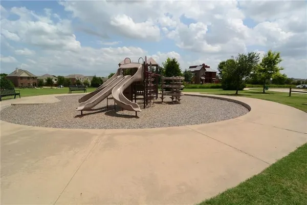 a park view with a bench