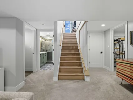 a view of entryway with stairs and wooden floor