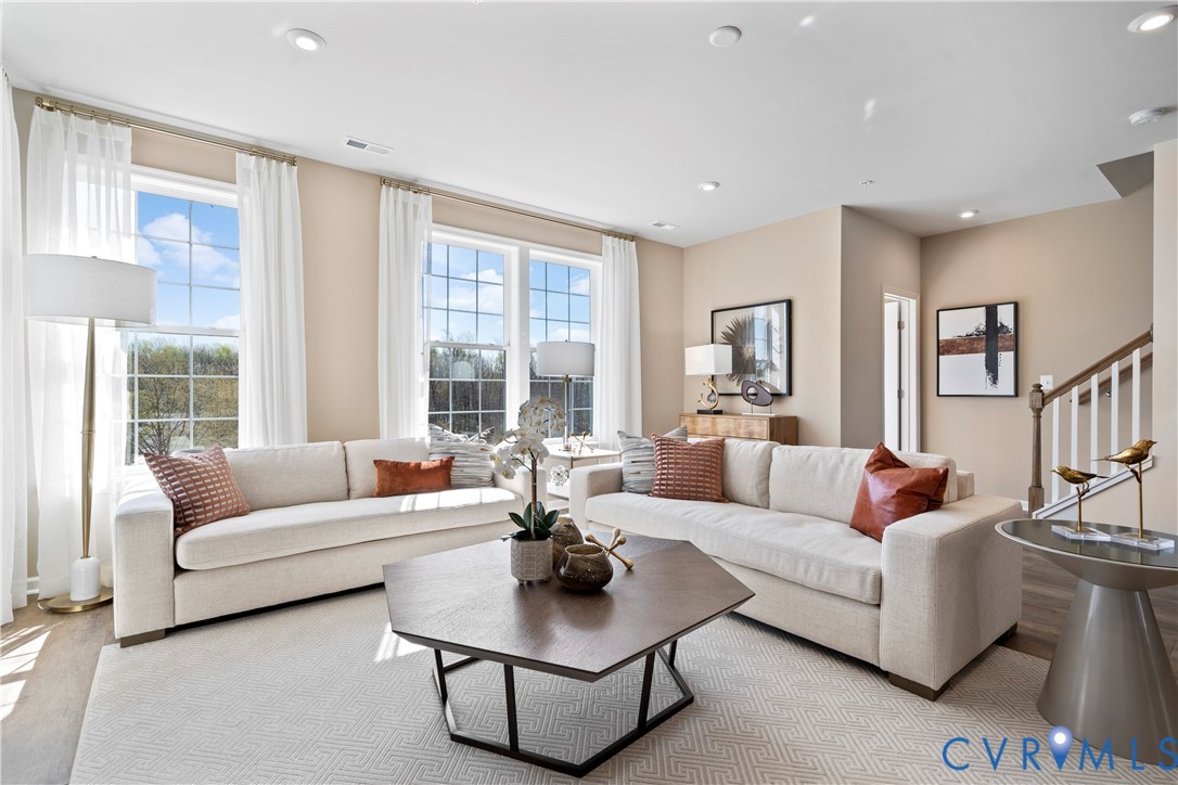 13133 Brattice Loop Midlothian, VA 23114 - Photo 13 of 40 a living room with furniture and a large window