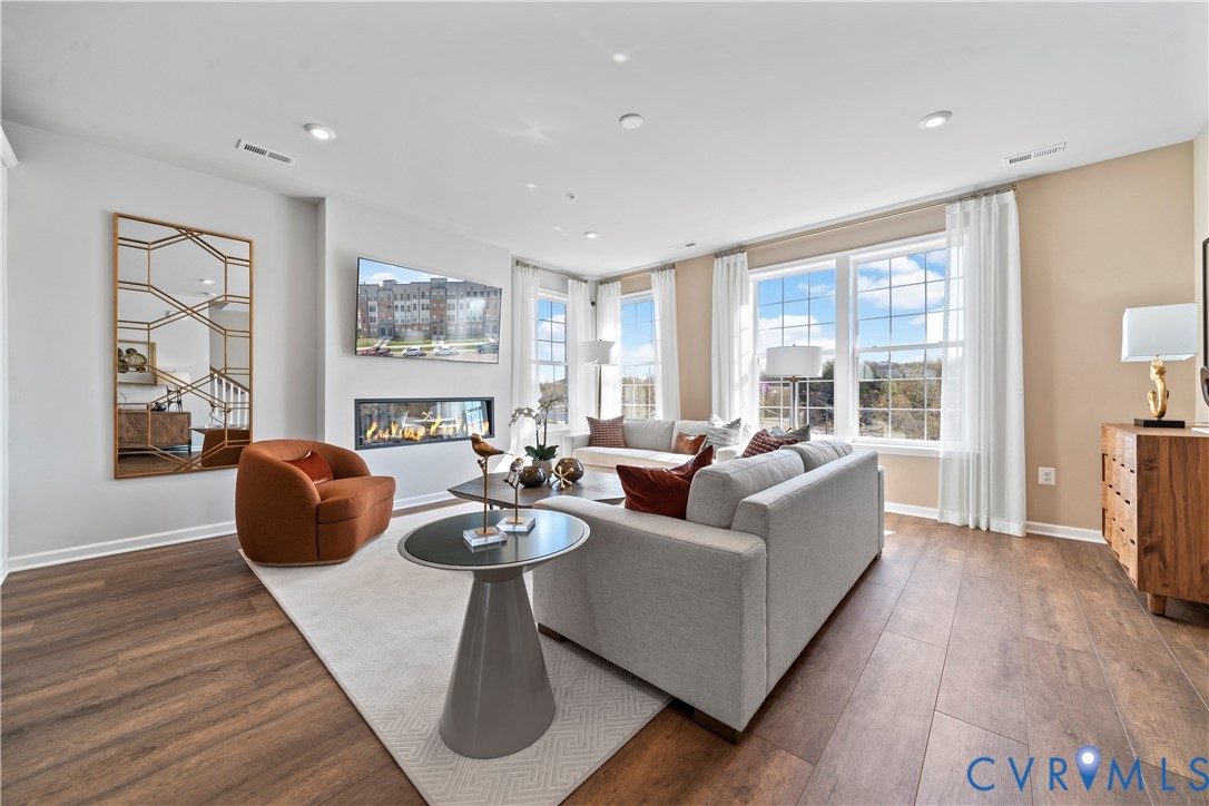 13133 Brattice Loop Midlothian, VA 23114 - Photo 14 of 40 a living room with furniture and a large window