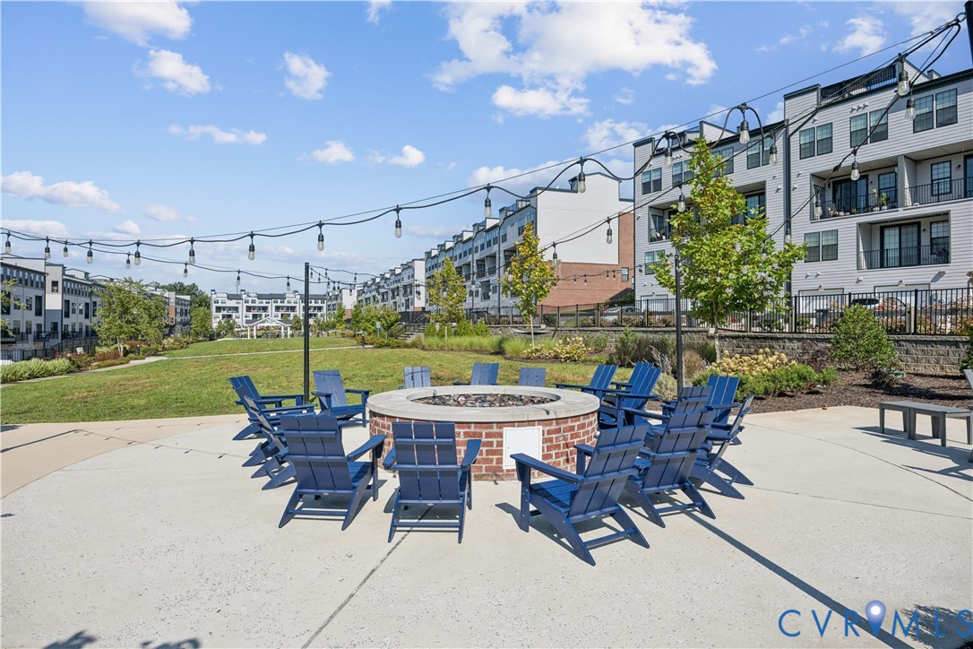 13133 Brattice Loop Midlothian, VA 23114 - Photo 35 of 40 a view of a patio with a table and chairs