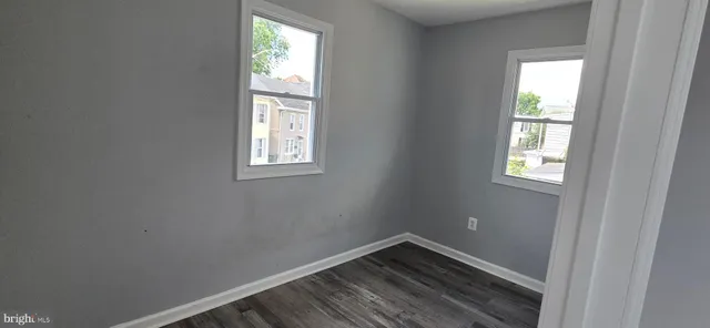 a view of an empty room and window