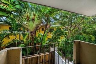 651 Northeast 60th Street, Unit 25 Miami, FL 33137 - Photo 18 of 23 a balcony with an outdoor space