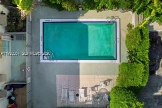 651 Northeast 60th Street, Unit 25 Miami, FL 33137 - Photo 22 of 23 an aerial view of a house with a yard