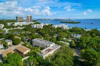 651 Northeast 60th Street, Unit 25 Miami, FL 33137 - Photo 23 of 23 a view of a lake with a city