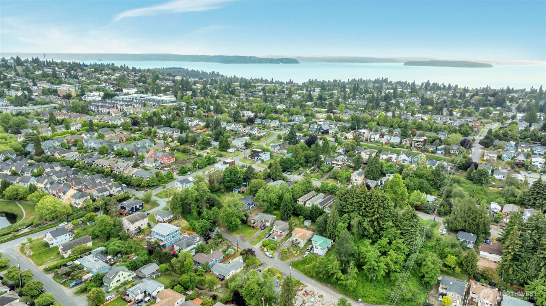 5630 32nd Avenue Southwest Seattle, WA 98126 - Photo 16 of 21 an aerial view of a residential houses with city view