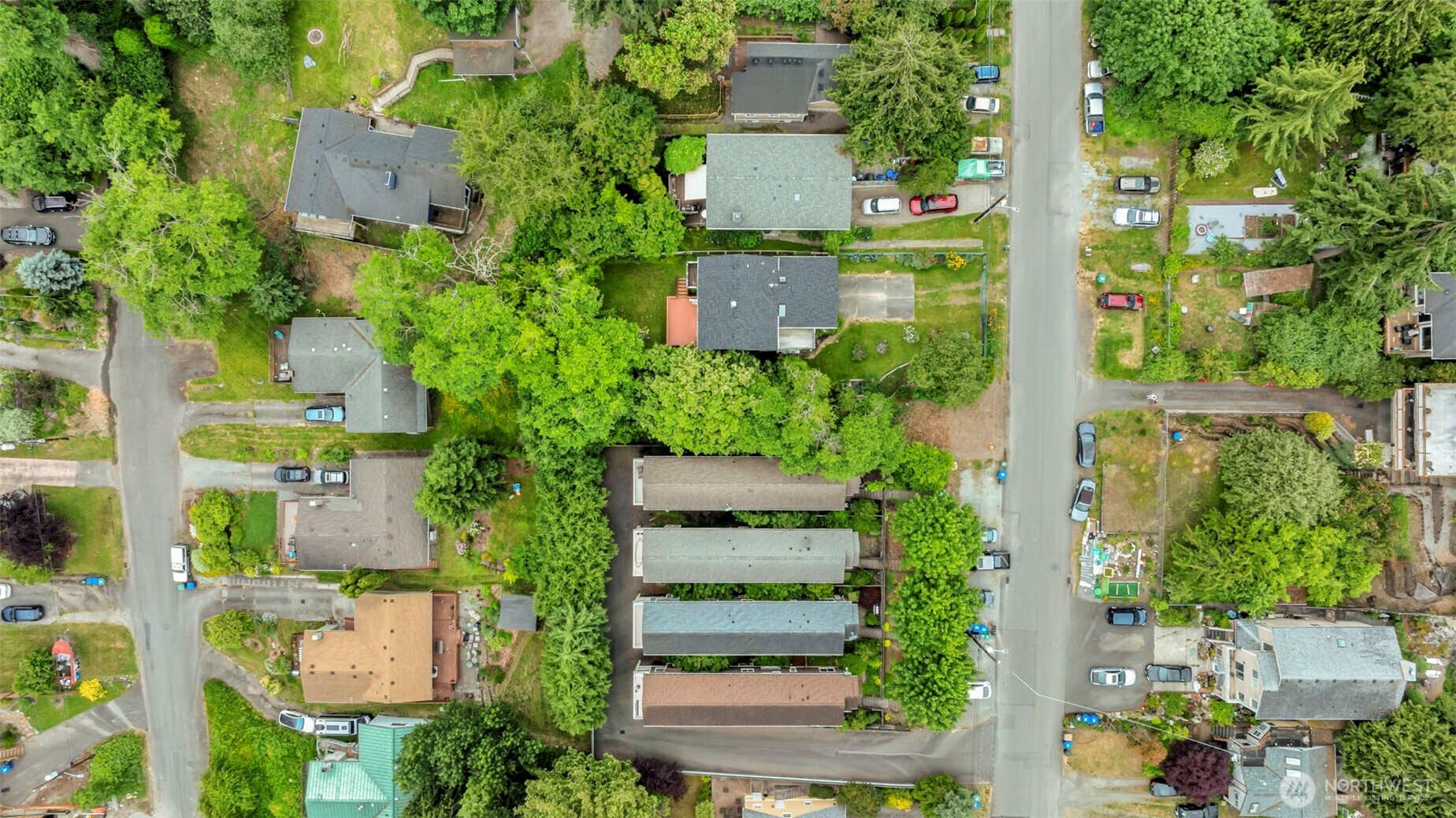 5630 32nd Avenue Southwest Seattle, WA 98126 - Photo 4 of 21 an aerial view of a house with a yard and tree s