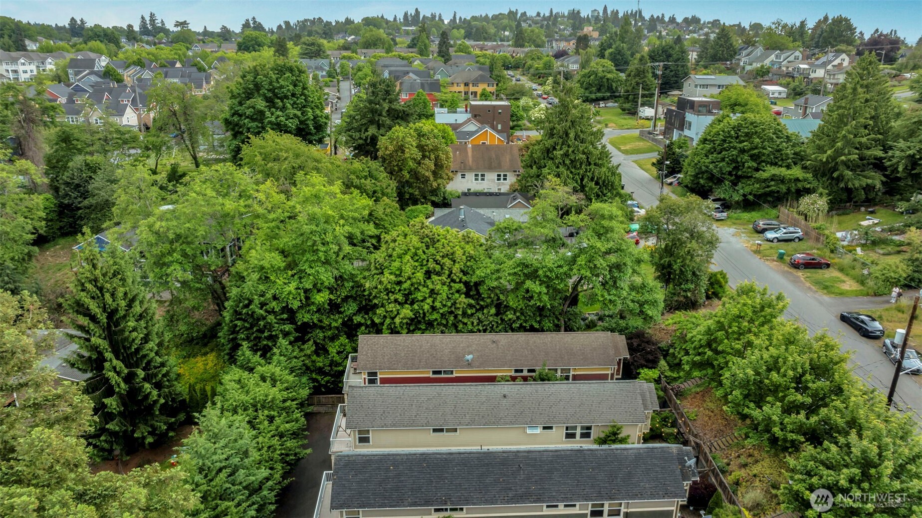 5630 32nd Avenue Southwest Seattle, WA 98126 - Photo 10 of 21 an aerial view of residential house with outdoor space and trees all around