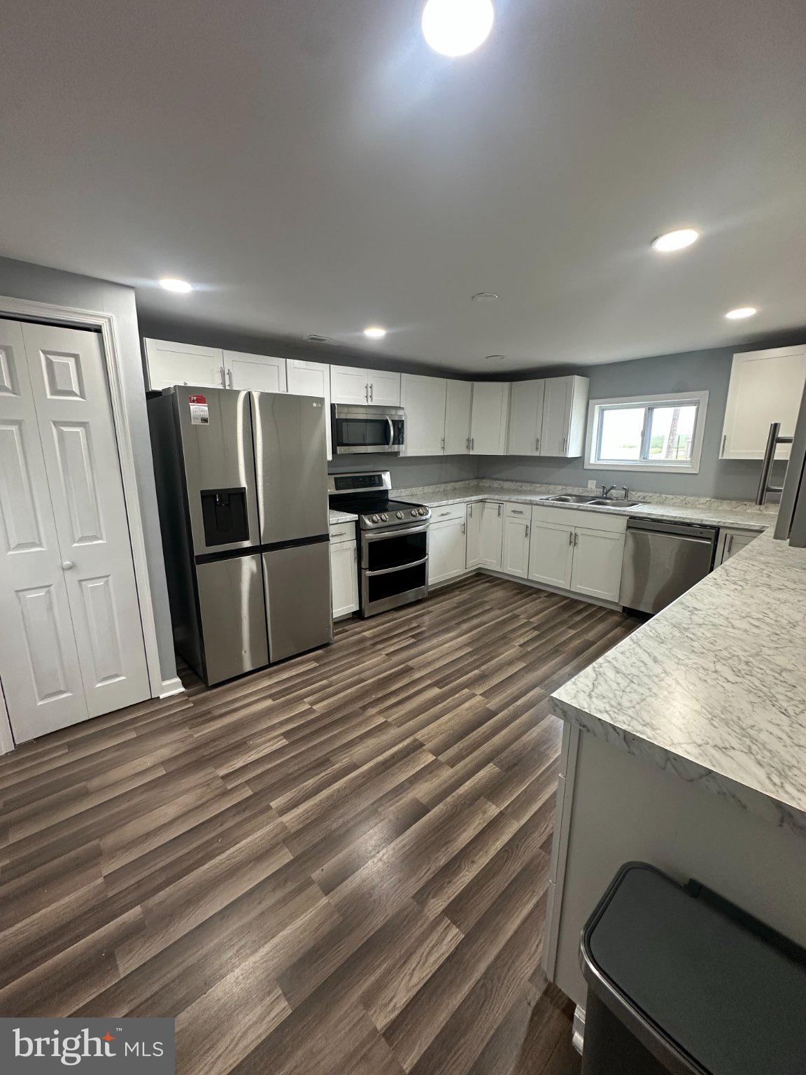 108 Bell Street Dover, DE 19901 - Photo 6 of 16 Modern kitchen with sleek finishes.