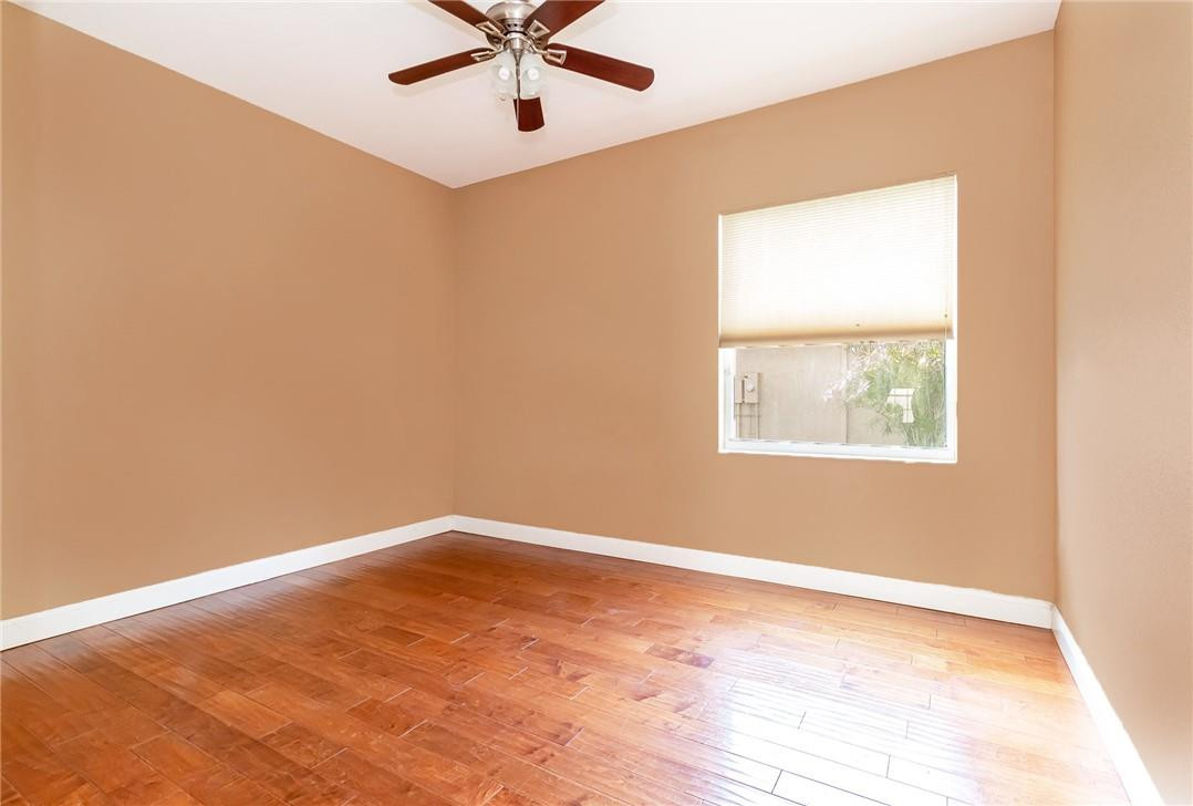 19471 Southwest 39th Street Miramar, FL 33029 - Photo 19 of 50 an empty room with a window and a ceiling fan