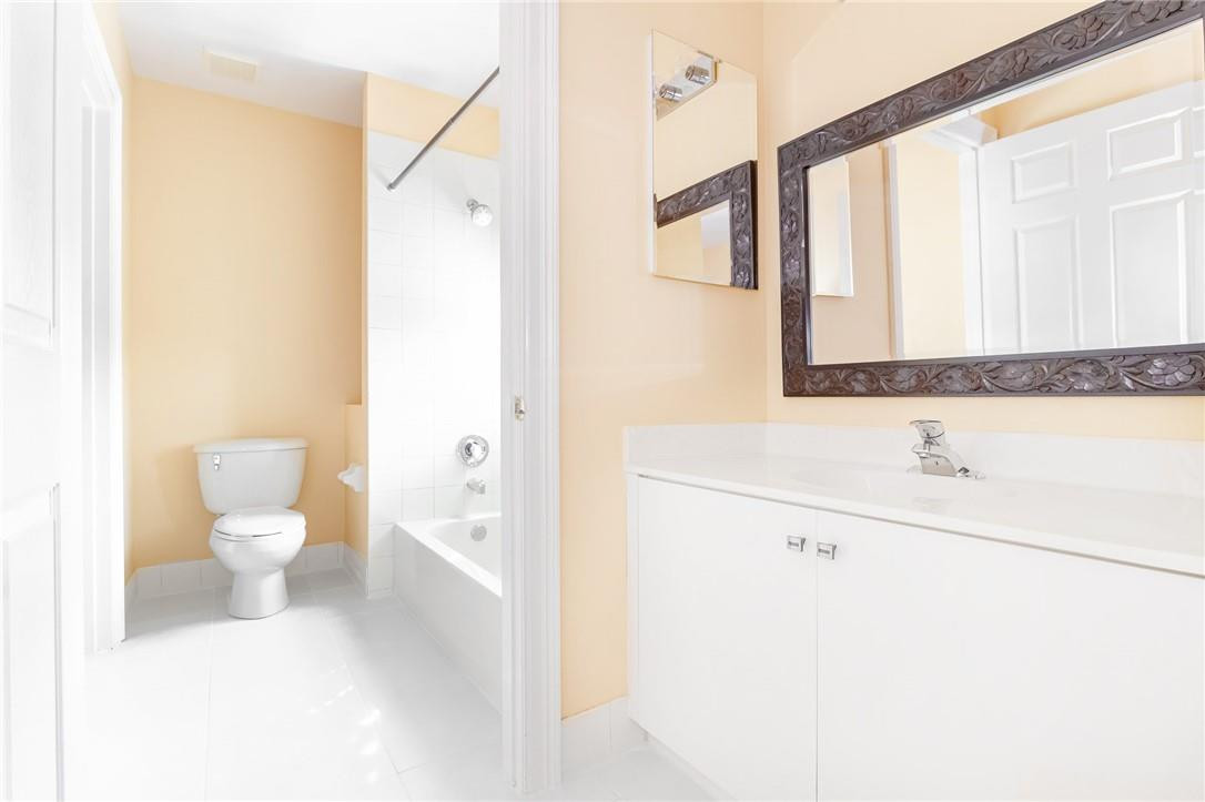 19471 Southwest 39th Street Miramar, FL 33029 - Photo 25 of 50 a bathroom with a sink a toilet and a mirror