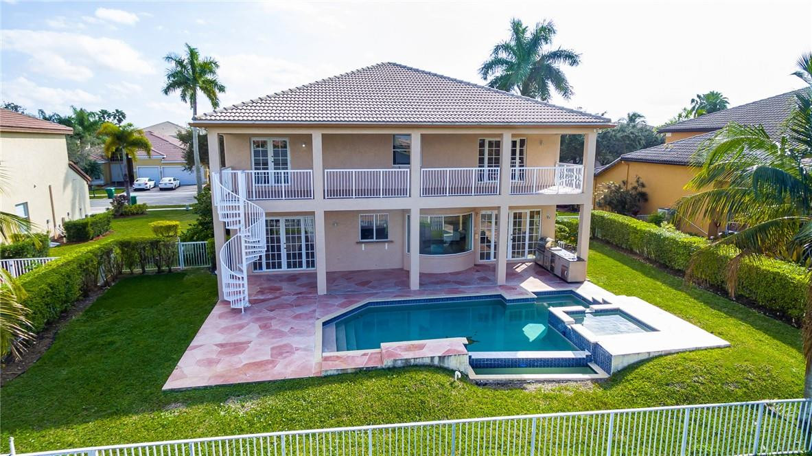 19471 Southwest 39th Street Miramar, FL 33029 - Photo 6 of 50 a view of house with swimming pool outdoor seating