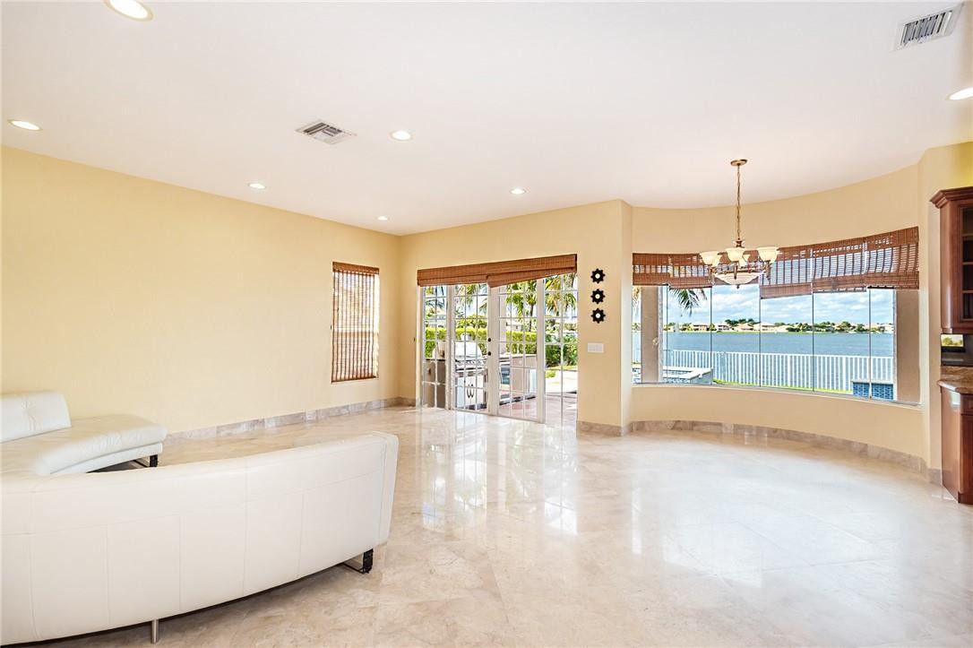 19471 Southwest 39th Street Miramar, FL 33029 - Photo 7 of 50 a living room with furniture and a large window