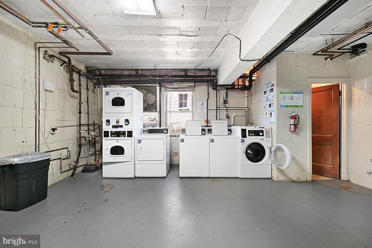 3925 Davis Place Northwest, Unit 206 Washington, DC 20007 - Photo 19 of 26 a utility room with dryer and washer