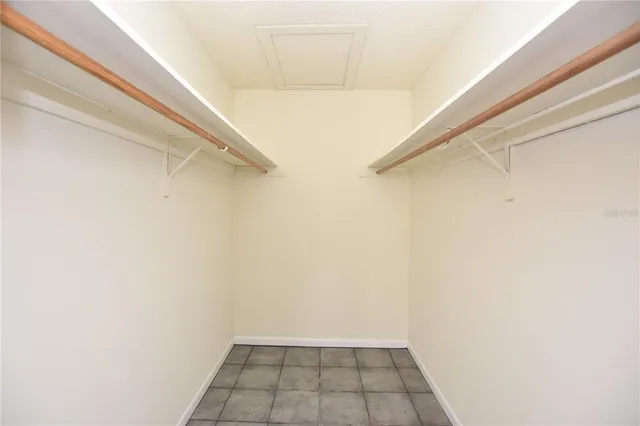 a view of a room with white walls