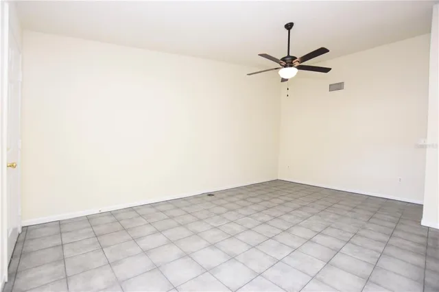 a view of a room with a fan