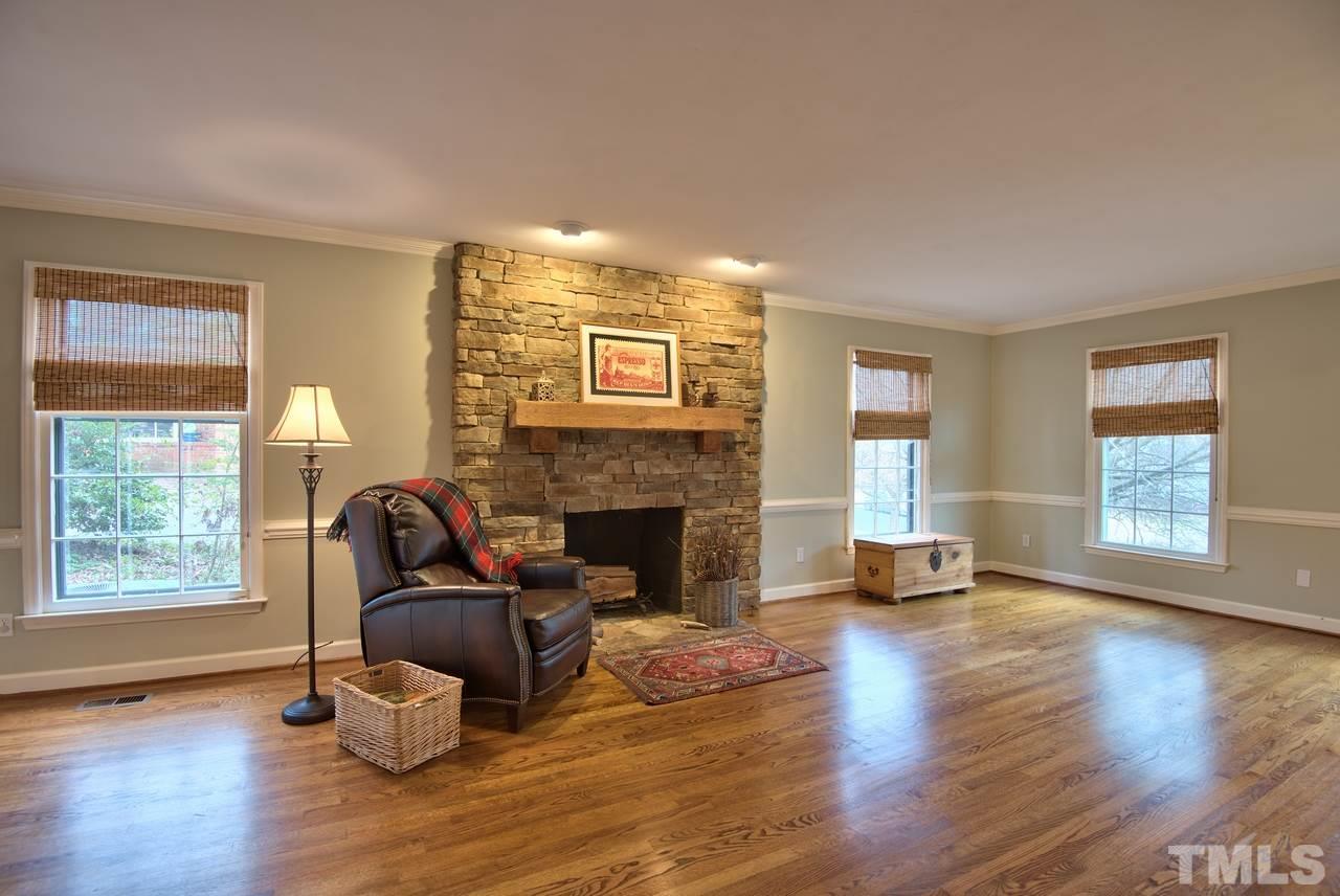 3916 St Marks Road Durham, NC 27707 - Photo 3 of 25 with beautiful stone wood-burning fireplace