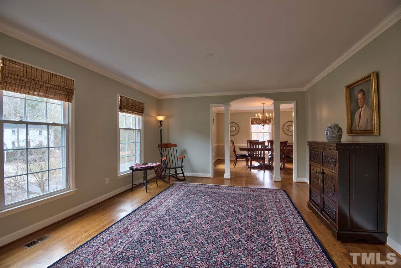 3916 St Marks Road Durham, NC 27707 - Photo 5 of 25 Plenty of space for formal living surrounded by grand columns.