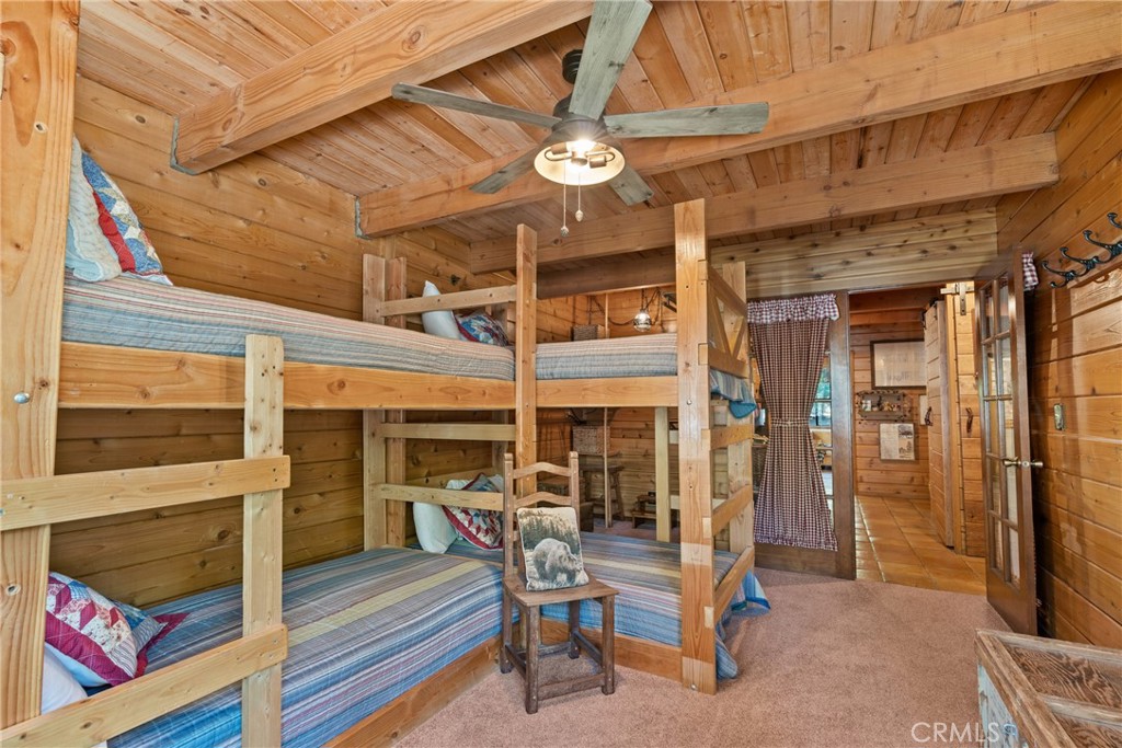 116 Pine Ridge Road Crestline, CA 92325 - Photo 14 of 35 a view of a patio with table and chairs