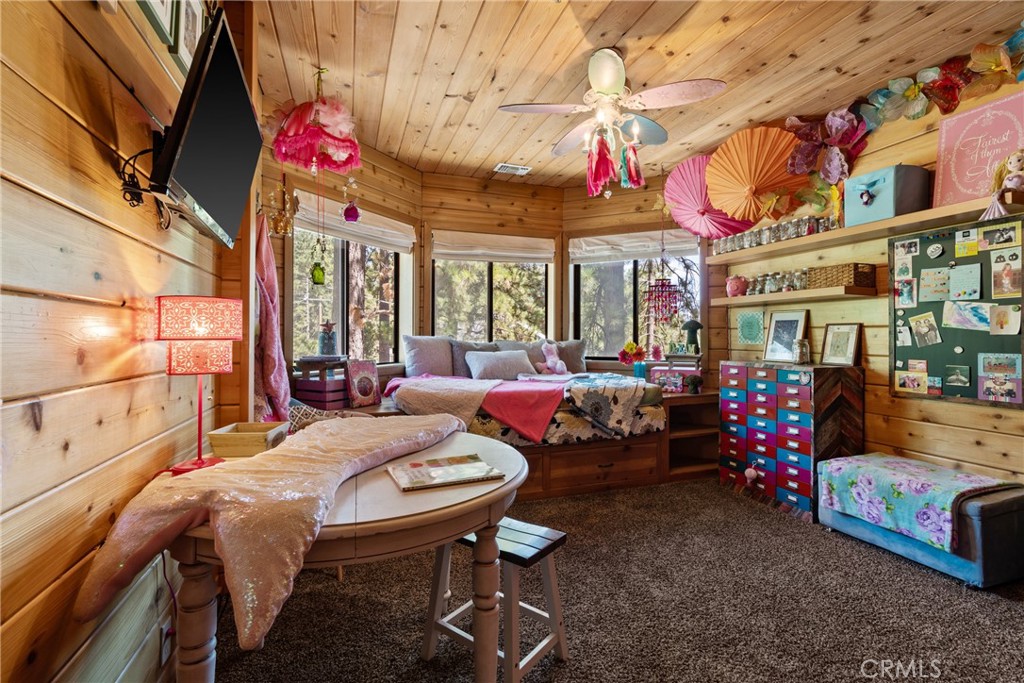 116 Pine Ridge Road Crestline, CA 92325 - Photo 23 of 35 a outdoor space with lots of furniture and chandelier