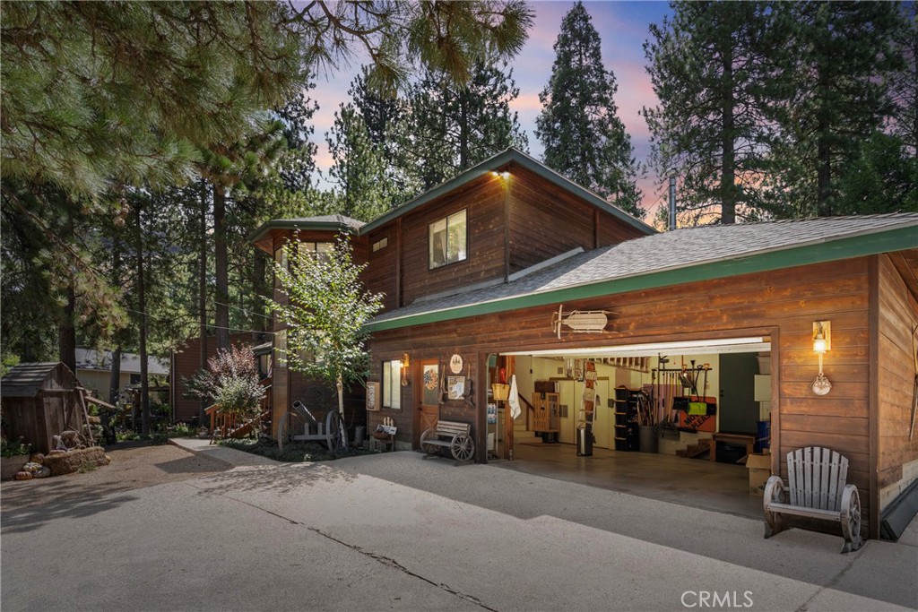 116 Pine Ridge Road Crestline, CA 92325 - Photo 30 of 35 a view of a chairs and a garage