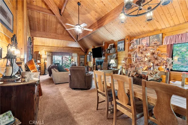 a view of a patio with table and chairs