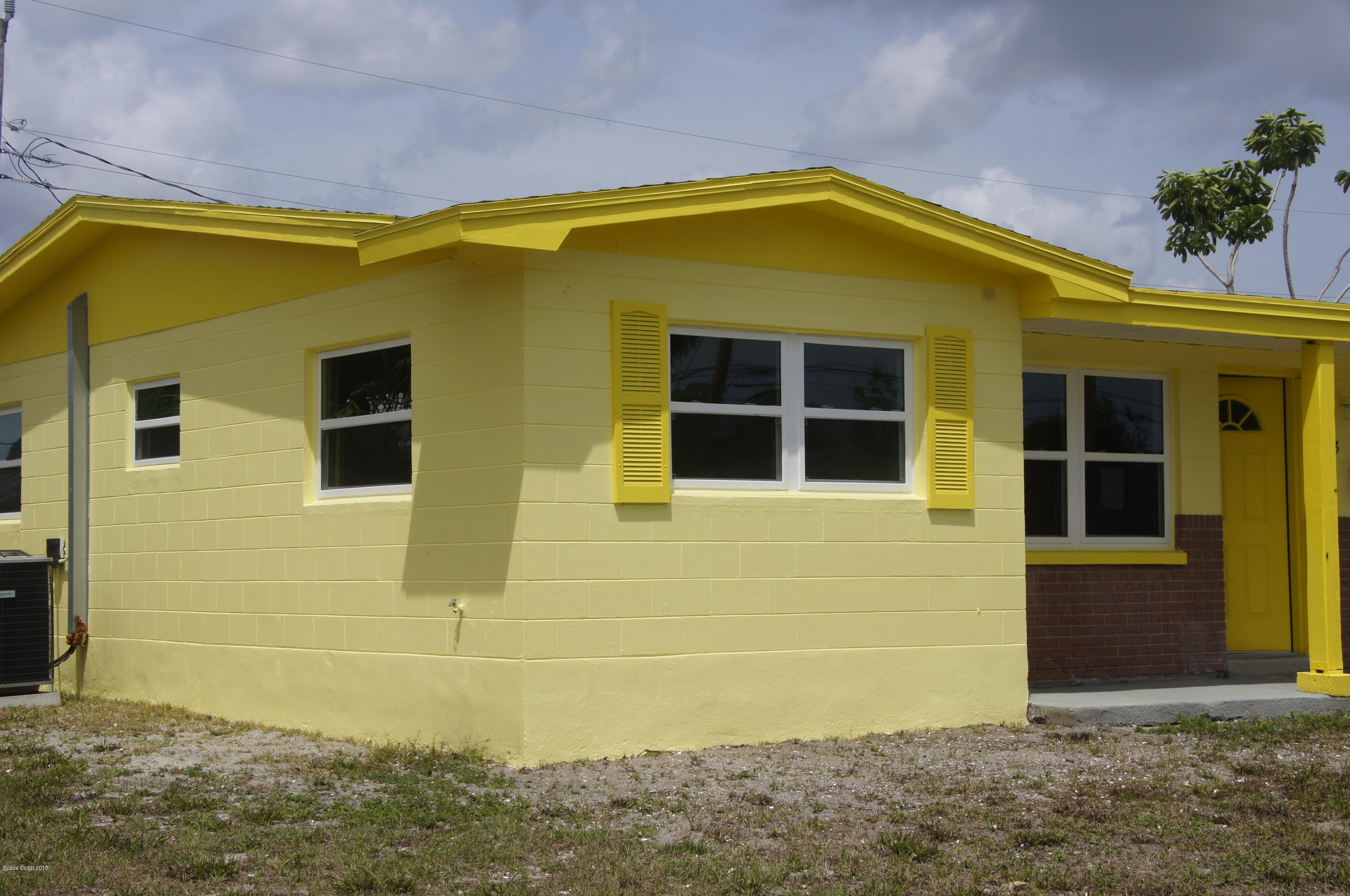 758 Croton Road Melbourne, FL 32935 - Photo 18 of 36 758 Croton Exterior Front Side Beds _DSC